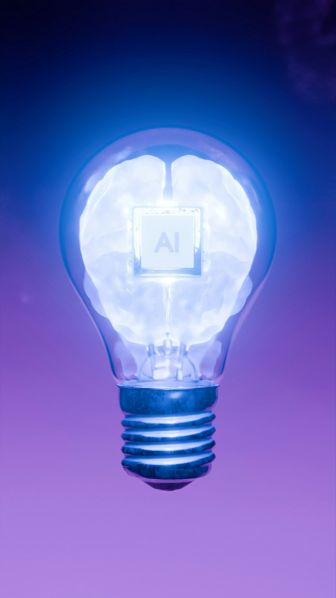 Conceptual render of artificial intelligence processor chip embedded in a white human brain inside a transparent light bulb, floating against blue purple gradient background with copy space